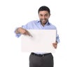 Happy attractive businessman holding blank billboard as copyspace Royalty Free Stock Photo