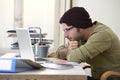 Happy attractive hipster businessman working with computer laptop at home office Royalty Free Stock Photo