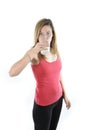 Happy attractive mature woman on her 40s drinking milk in health concept