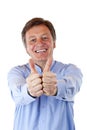 Happy, attractive senior man shows both thumbs Royalty Free Stock Photo