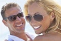 Happy Attractive Woman and Man Couple At Beach Royalty Free Stock Photo