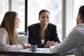 Happy attractive young African business woman meeting with office friends Royalty Free Stock Photo