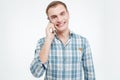 Happy attractive young man talking on cell phone Royalty Free Stock Photo