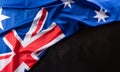 Happy Australia day concept. Australian flag against dark stone background. 26 January Royalty Free Stock Photo