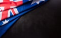 Happy Australia day concept. Australian flag against dark stone background. 26 January Royalty Free Stock Photo