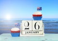 Happy Australia Day, January 26, theme white wood vintage calendar with ocean view Royalty Free Stock Photo