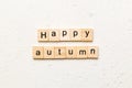 Happy autumn word written on wood block. Happy autumn text on cement table for your desing, concept Royalty Free Stock Photo