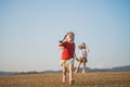 Happy baby asian girl smiling. little girl running and smiling at sunset happy baby girl smiling. little baby running at sunset.