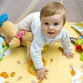 Happy baby on bed