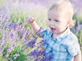 Happy baby boy in lavender