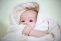 Happy baby boy wrapped towel after bath Royalty Free Stock Photo