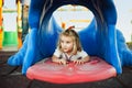 Happy baby child playing at the playground at sunset Royalty Free Stock Photo