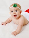 Happy baby in a Christmas stocking