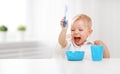 Happy baby eating himself Royalty Free Stock Photo