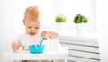 Happy baby eating himself Royalty Free Stock Photo