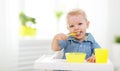 Happy baby eating himself Royalty Free Stock Photo