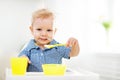 Happy baby eating himself Royalty Free Stock Photo