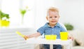 Happy baby eating himself Royalty Free Stock Photo