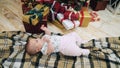 Happy baby near Christmas tree