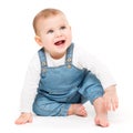 Happy Baby, Infant Kid Sitting on white, One year old Child in Jeans Royalty Free Stock Photo