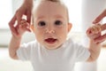 Happy baby learning to walk with mother help Royalty Free Stock Photo