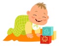 Happy baby playing with cubes. Laughing little kid