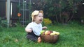 Happy Baby Sitting With Soccer Black White Classic Ball On Green Grass. Adorable Infant Baby Playing Outdoors In Royalty Free Stock Photo