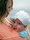 Happy baby in sling Royalty Free Stock Photo