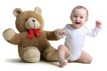 happy baby with teddy bear