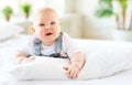 Happy baby toddler in bed Royalty Free Stock Photo