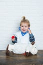 Happy baby veterinarian examine toy animal with stethoscope