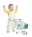 Happy baby walking with shopping cart Royalty Free Stock Photo