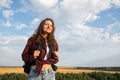 Happy backpack traveler woman looking forward Royalty Free Stock Photo