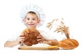 Happy baker boy with a loaf of rye bread Royalty Free Stock Photo