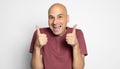 Happy bald man is showing thumbs up. Isolated Royalty Free Stock Photo