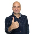 Happy bald man showing thumbs up. Isolated Royalty Free Stock Photo
