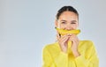 Happy, banana and portrait of woman with fruit in studio for healthy eating, wellness and diet. Food, lose weight and