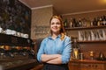 Happy barista woman at coffee shop Royalty Free Stock Photo