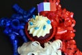 Happy Bastille Day cupcake with red, white and blue french flag Royalty Free Stock Photo