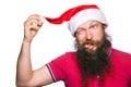 Happy bearded happy man with red hat and t-shirt, studio shot. Royalty Free Stock Photo