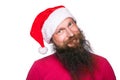 Happy bearded happy man with red hat and t-shirt, studio shot. Royalty Free Stock Photo