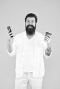 happy bearded man hipster wearing white shirt with a cup of coffee cup feel happiness about great news, joy of success Royalty Free Stock Photo