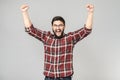 Happy bearded man raising his hands showing victory gesture Royalty Free Stock Photo