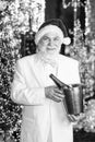 Happy bearded man. Santa drink champagne. Winter celebration. New year gifts. Winter tradition. Adult party concept