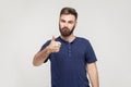 Happy bearded man showing thumb up and smile. Royalty Free Stock Photo