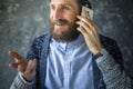 Happy Bearded Man Talk at Phone