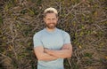 happy bearded mature man in summer shirt on plant wall background, summer style Royalty Free Stock Photo