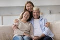 Happy beautiful adult daughter woman hugging elder mom Royalty Free Stock Photo