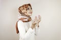 Happy beautiful Asian Muslim girl wearing a headscarf praying to God Royalty Free Stock Photo