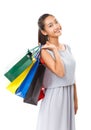 Happy beautiful asian woman holding many colorful shopping bags Royalty Free Stock Photo